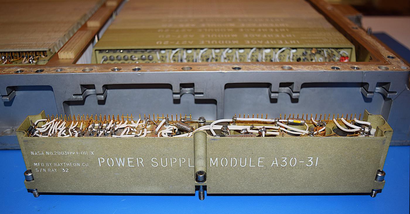 The power supply module in front of the AGC. The module in position A30 provides +14 volts, while the (identical) module in position A31 provides +4 volts.