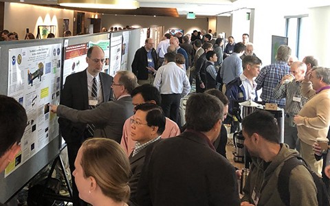 People at a poster session