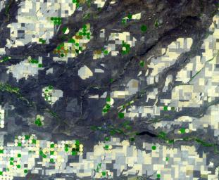 NASA's Terra spacecraft shows the Channeled Scablands in Washington, formed about 19,000 years ago when glacial Lake Missoula in Montana burst through its ice dam, and a 320 m deep lake emptied in a catastrophic flood that reached the Pacific Ocean.