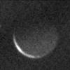 After its close approach to Pluto in July 2015, NASA's New Horizons spacecraft snapped this hauntingly beautiful image of the night side of Pluto's largest moon, Charon.