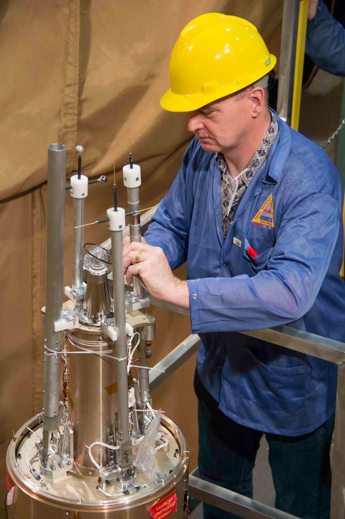 Dr. Collins stowing booms after deployment testing.