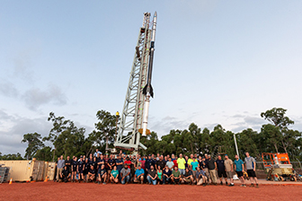 XQC payload team with rocket in Australia.