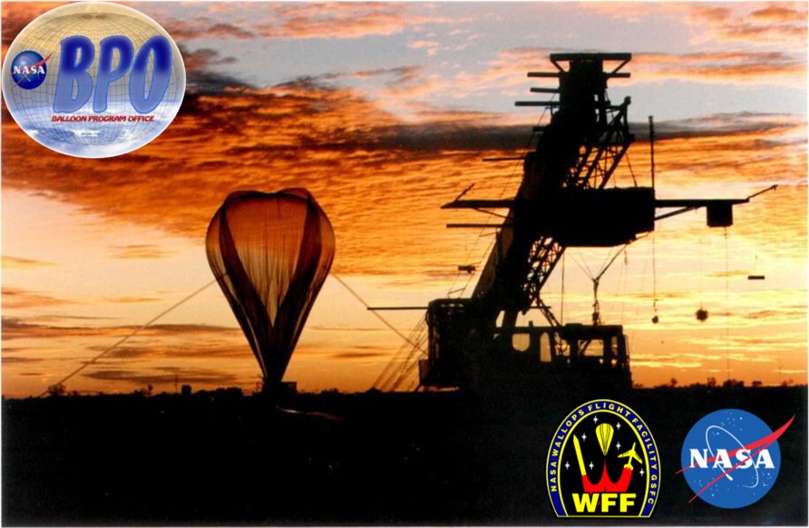 A high-altitude balloon is inflated in the distance