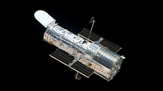 Since its launch in 1990, the Hubble Space Telescope has changed our fundamental understanding of the universe.  Hubble’s unique design, allowing it to be repaired and upgraded with advanced technology by astronauts, has made it one of NASA’s longest-living and most valuable observatories.  Today, Hubble continues to provide views of cosmic wonders never before seen and is still at the forefront of astronomy.
The Hubble Space Telescope is an international collaboration between NASA and the European Space Agency (ESA).For more information visit us at https://nasa.gov/hubble or follow us on social media @NASAHubble.