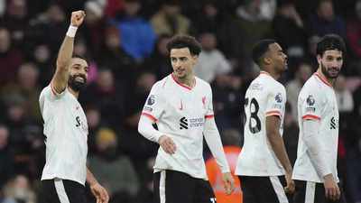 Mohamed Salah double fires Liverpool nine points clear