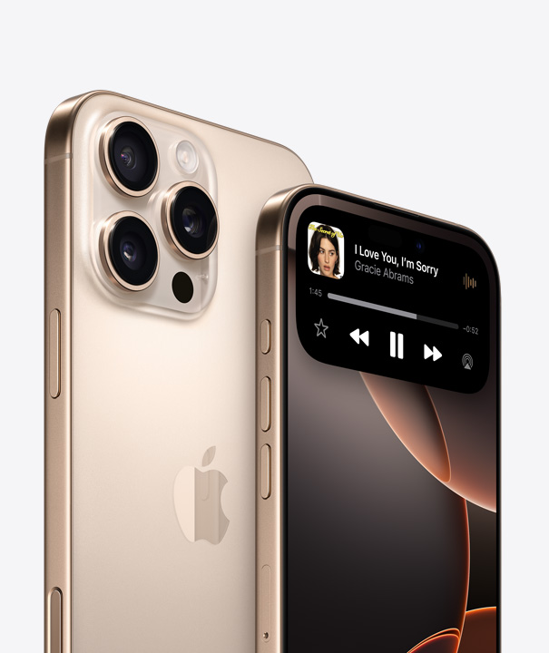 Back of iPhone 16 Pro in Natural Titanium showing three camera lenses behind another iPhone 16 Pro highlighting Dynamic Island capabilities on display screen.