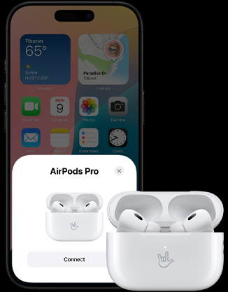 Et åbent opladningsetui med AirPods 4 indeni samt en iPhone, som viser, at AirPods 4 er blevet tilsluttet.