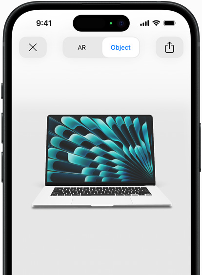 En forhåndstitt på MacBook Air i sølv, vist i utvidet virkelighet på en iPhone