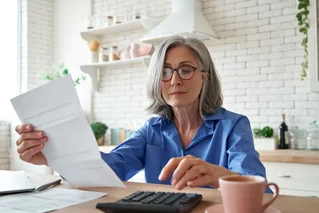 woman reading document