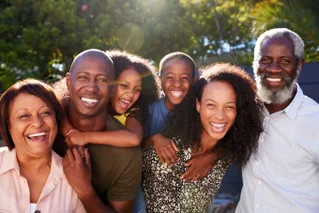 Family smiling at camera