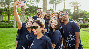 Group photo of colleagues smiling