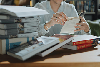 woman reading books