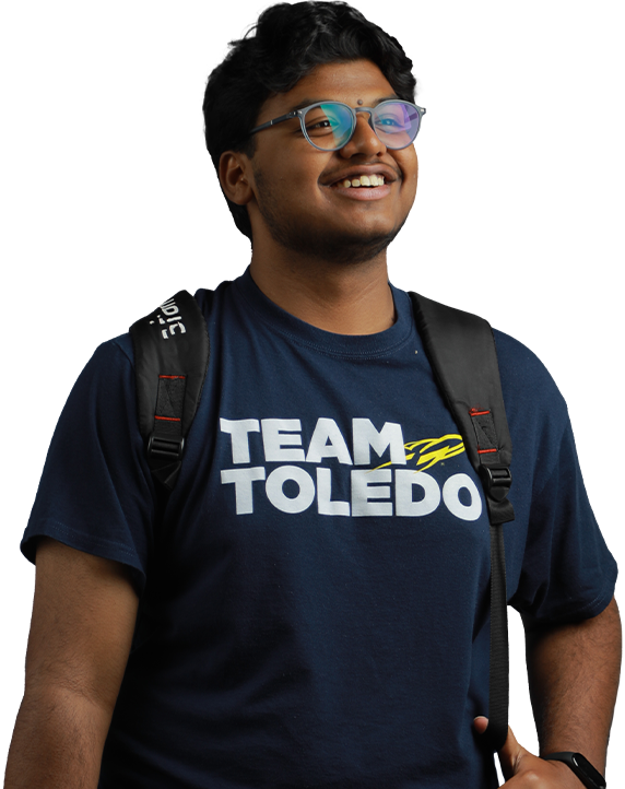 A UToledo student looking up and smiling