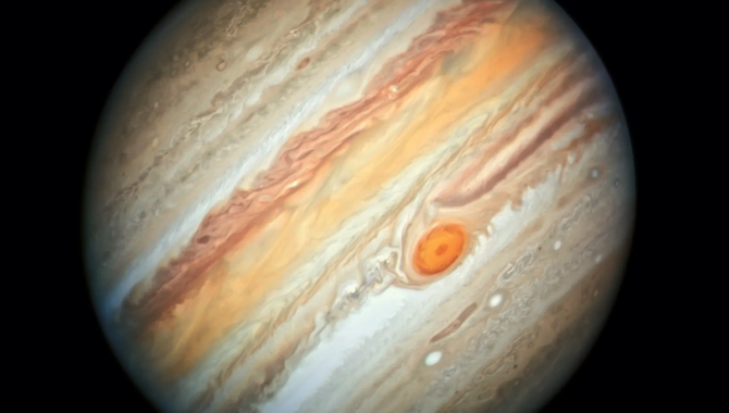 Although astronomers have been observing Jupiter for hundreds of years, there’s still a lot to learn about this mysterious world, where swirling storms roil the already turbulent atmosphere. Jupiter and its largest moons will come into sharper focus in the early 2030s, with the arrival of two new spacecraft. Credits: NASA, ESA, A. Simon (Goddard Space Flight Center), and M.H. Wong (University of California, Berkeley)