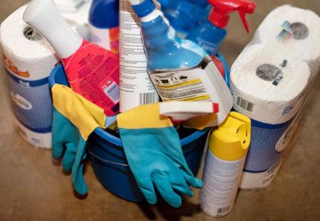 Cleaning supplies in a bucket