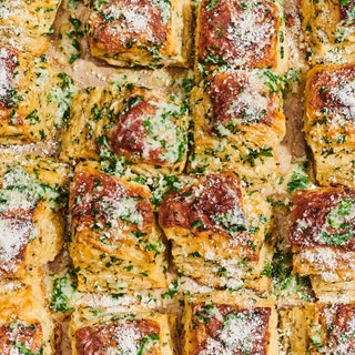 Garlic bread biscuits on a baking sheet