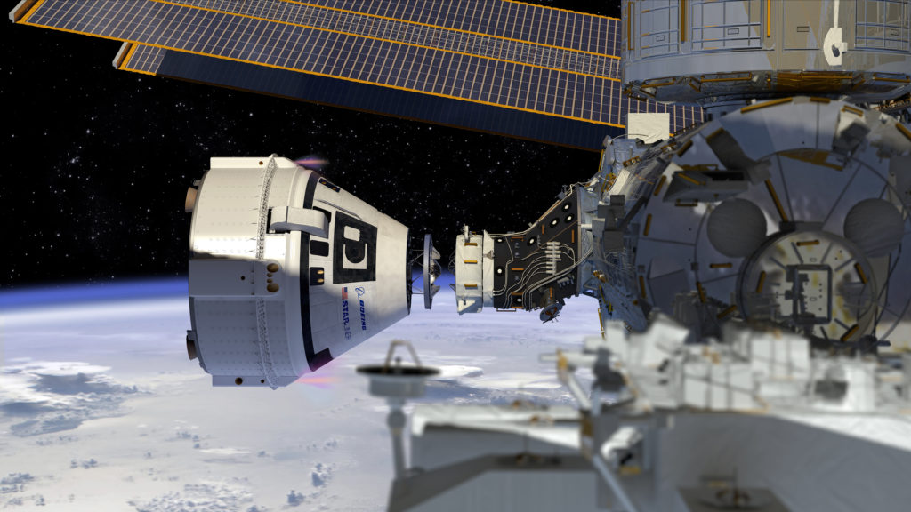 An artist image of the Boeing Starliner spacecraft docking to the International Space Station. 