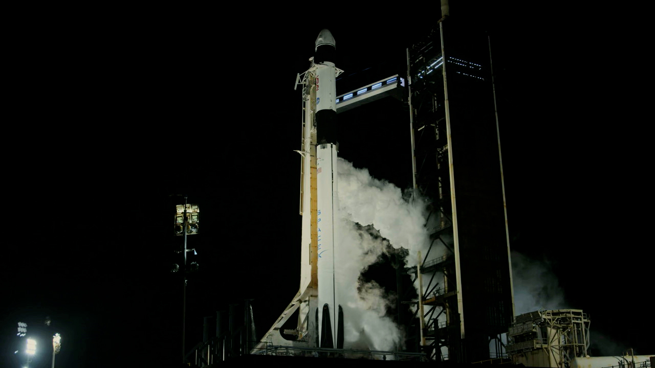 A SpaceX Falcon 9 rocket with the company’s Dragon spacecraft on top is seen on the launch pad at Launch Complex 39A at Kennedy Space Center.