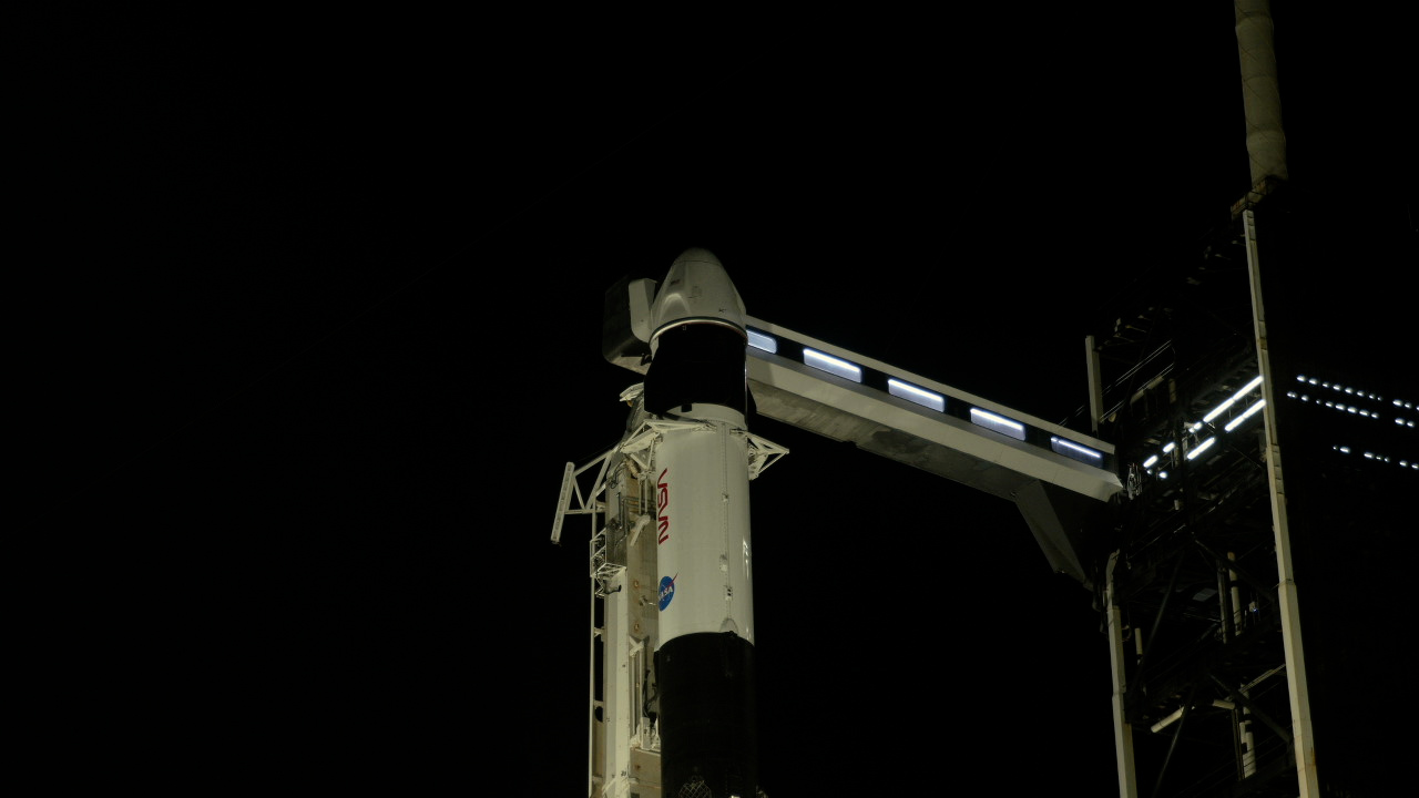 A SpaceX Falcon 9 rocket with the company's Dragon spacecraft on top is seen during sunset on the launch pad at Launch Complex 39A as preparations continue for the Crew-8 mission, Tuesday, Feb. 27, 2024, at NASA’s Kennedy Space Center in Florida.