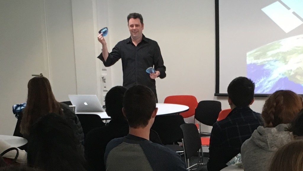 Josh Willis gives an impromptu science talk to 50 U.S. high school students who were also staying in Keflavik, Iceland. The students were in Iceland over their spring breaks on a trip focused on Science, Technology, Engineering and Math.