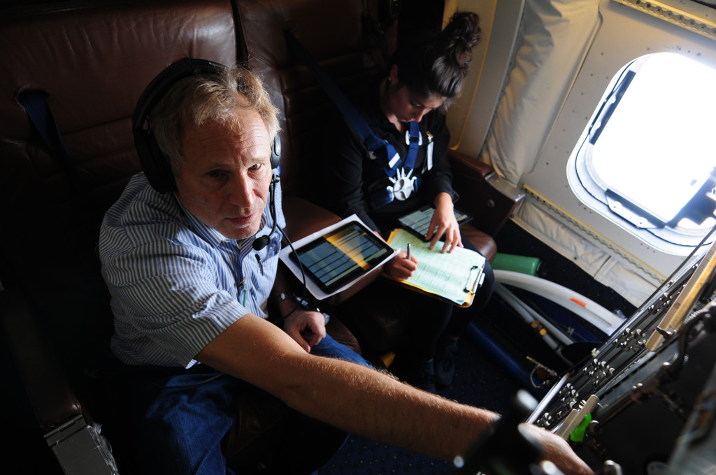 Scientists in airplane.