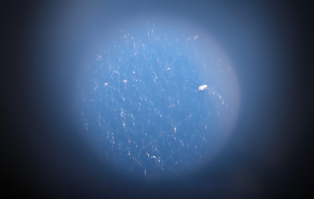 A perfect drop site, viewed through the tube where the ocean probes are dropped. Credit: NASA/Charlie Marshik