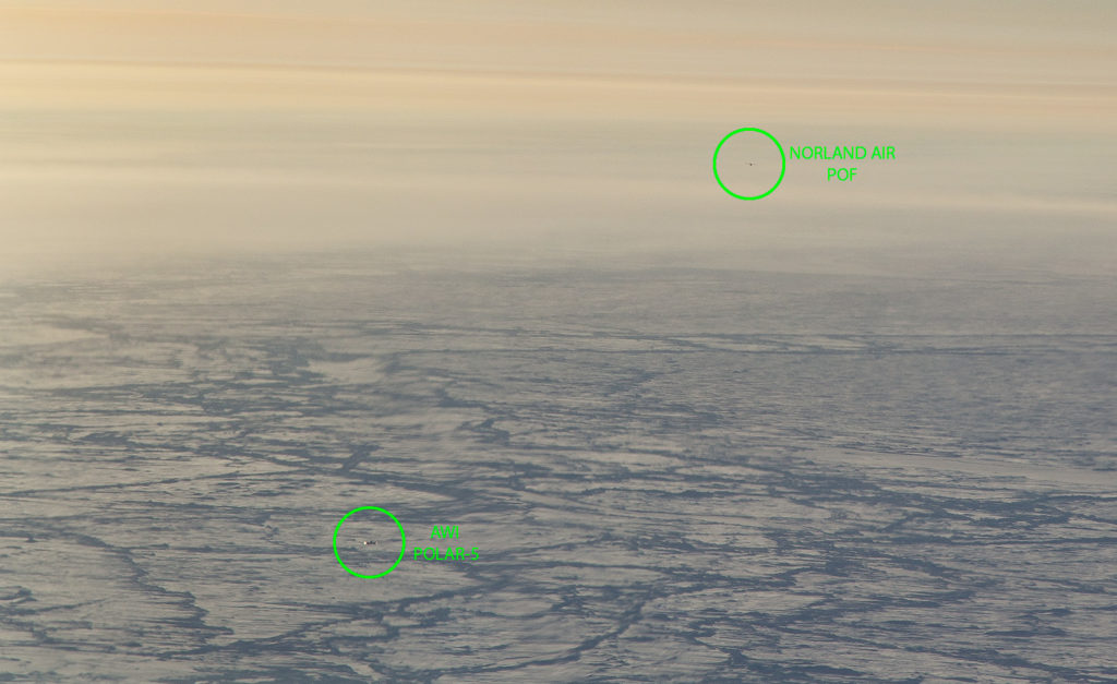 View from the P-3’s cockpit of the encounter with the Polar 5 and Twin Otter planes. Credit: NASA/Jeremy Harbeck