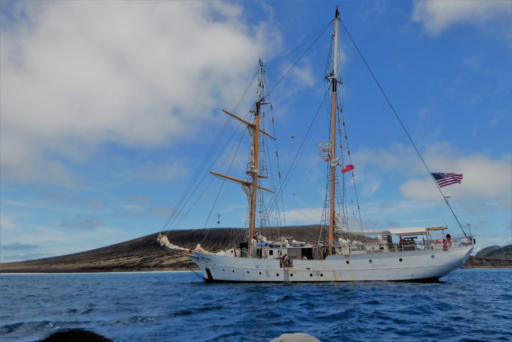 The SSV Robert C. Seamans of Woods Hole's SEA Semester program at Hunga Tonga-Hunga Ha'apai. Credit: Dan Slayback