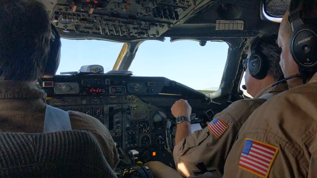 The view from the jump seat right after take-off. From here, Carsten as mission scientist can easily communicate with the pilots and flight engineer in the cockpit. Credit: NASA