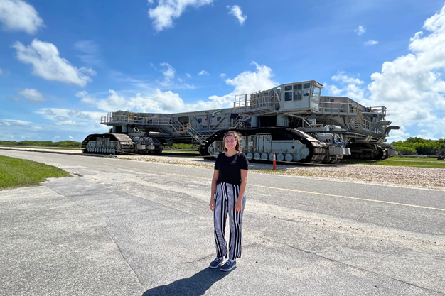 Shayla Wilhelm standing in front of the Launch Crawler