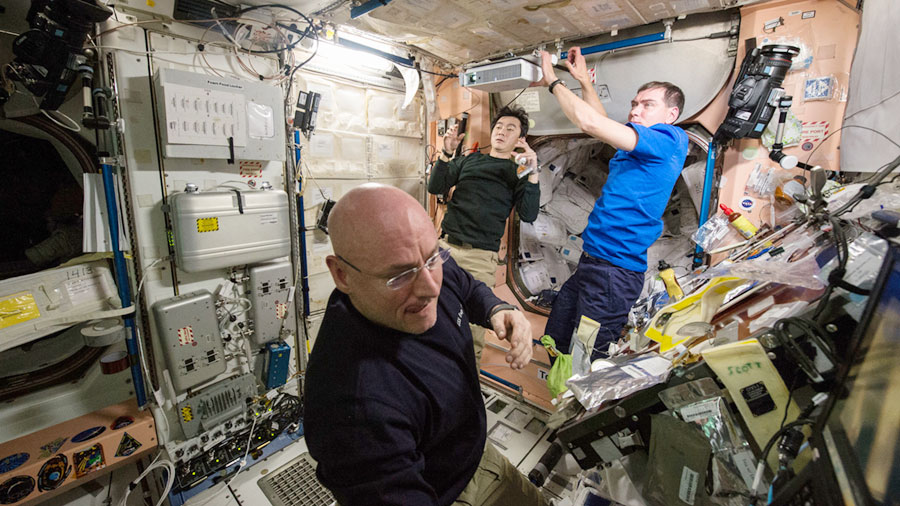 Crew Members Work in Unity Module