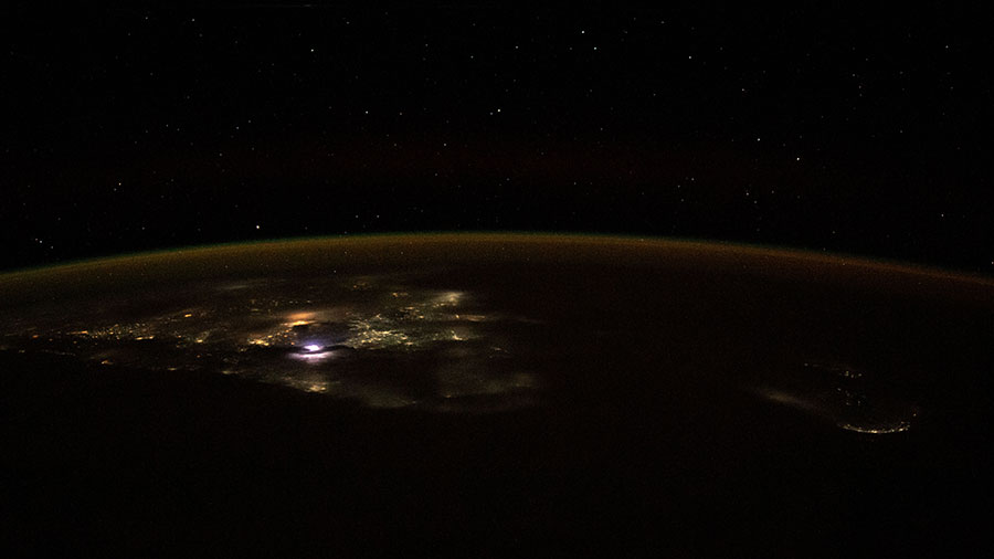 The city lights of southern India and the island nation of Sri Lanka, beneath the Earth's airglow, are pictured from the station as it orbited above the Indian Ocean.