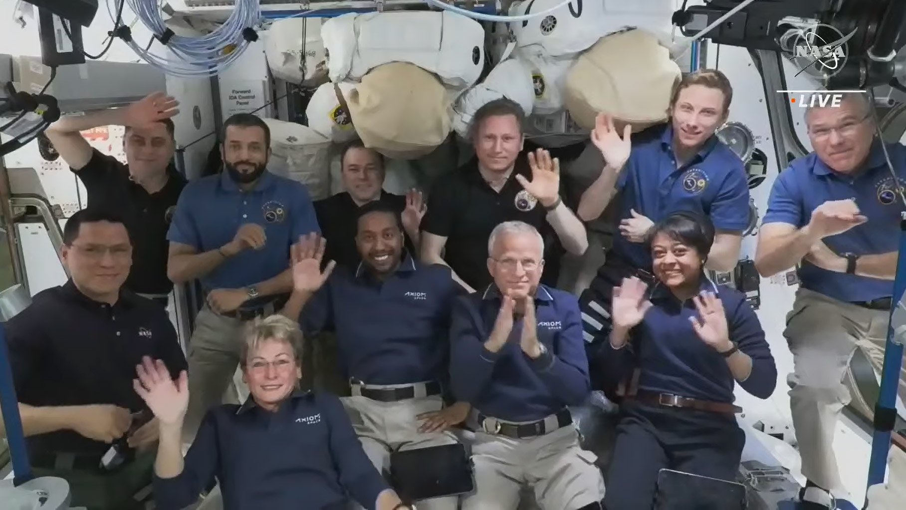 The Axiom Mission-2 (Ax-2) and Expedition 69 crew members join each other for a Crew Farewell Ceremony on May 29, 2023. In the front row (from left) are, Ax-2 crew mates Peggy Whitson, Ali Alqarni, John Shoffner, and Rayyanah Barnawi. In the back (from left) are, Expedition 69 crew mates Frank Rubio, Andrey Fedyaev, Sultan Alneyadi, Dmitri Petelin, Sergey Prokopyev, Woody Hoburg, and Stephen Bowen.