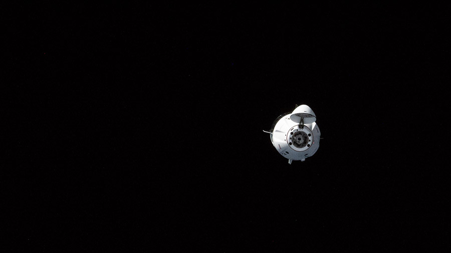 The SpaceX Freedom Dragon crew ship with four Axiom Mission-2 private astronauts aboard is pictured approaching the International Space Station.