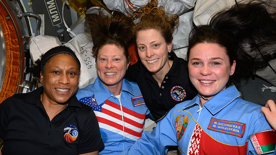 Posing for a portrait aboard the station (from left) are, NASA astronauts Jeanette Epps, Tracy C. Dyson, and Loral O'Hara, and Belarus spaceflight participant Marina Vasilevskaya.