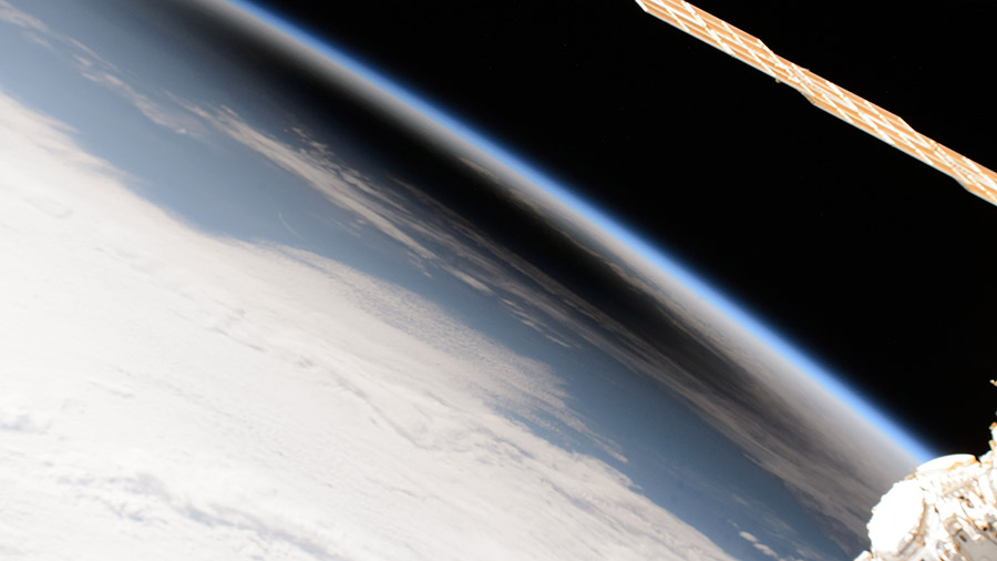 The Moon's shadow, or umbra, is pictured from the space station as it orbited into the path of the solar eclipse on April 8, 2024.