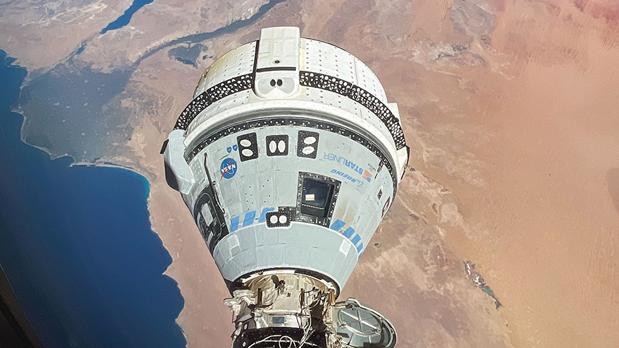 Boeing's Starliner spacecraft is pictured docked to the Harmony module's forward port as the International Space Station orbited above Egypt's Mediterranean coast.