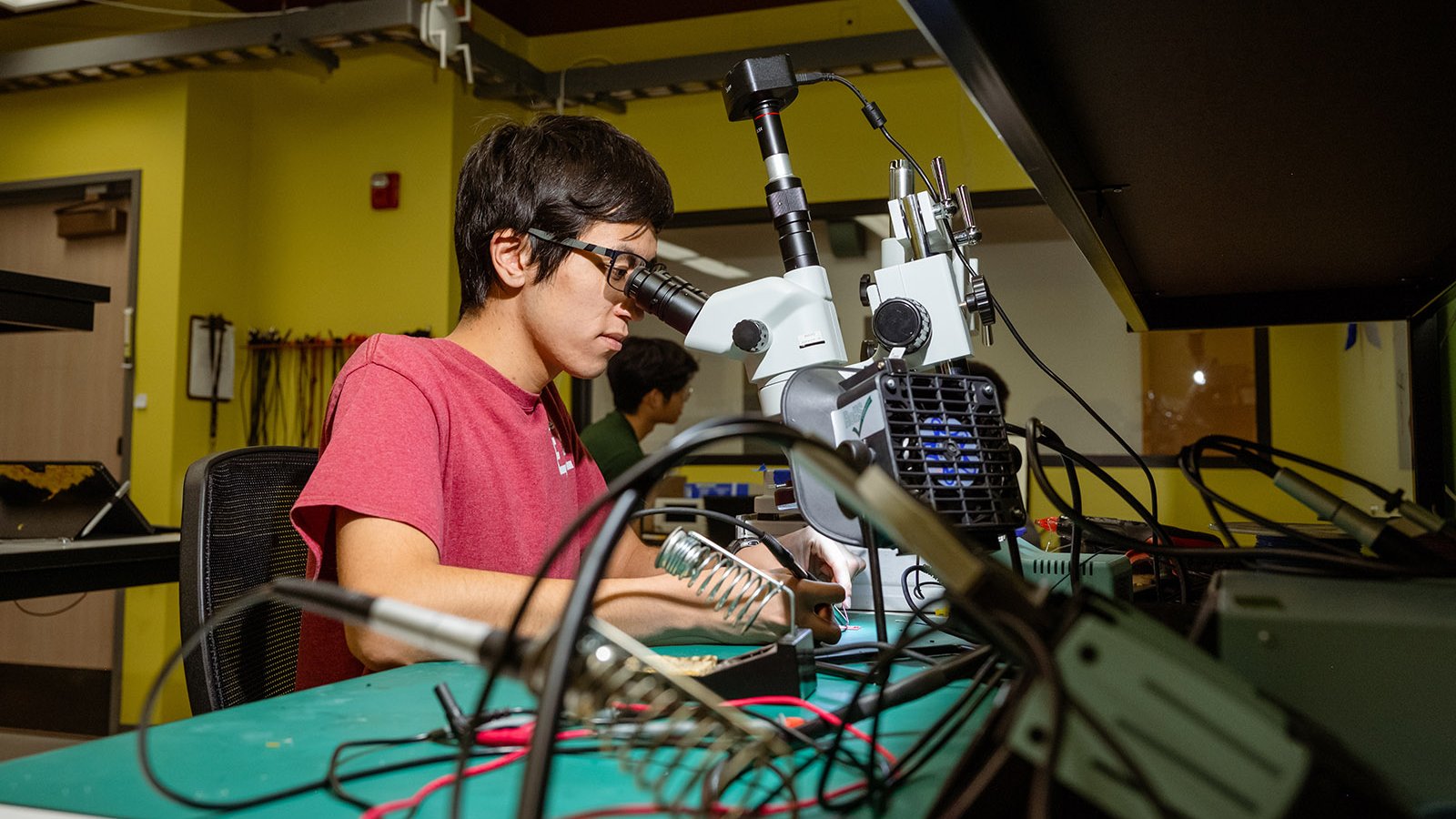 A photo of a person working in a lab