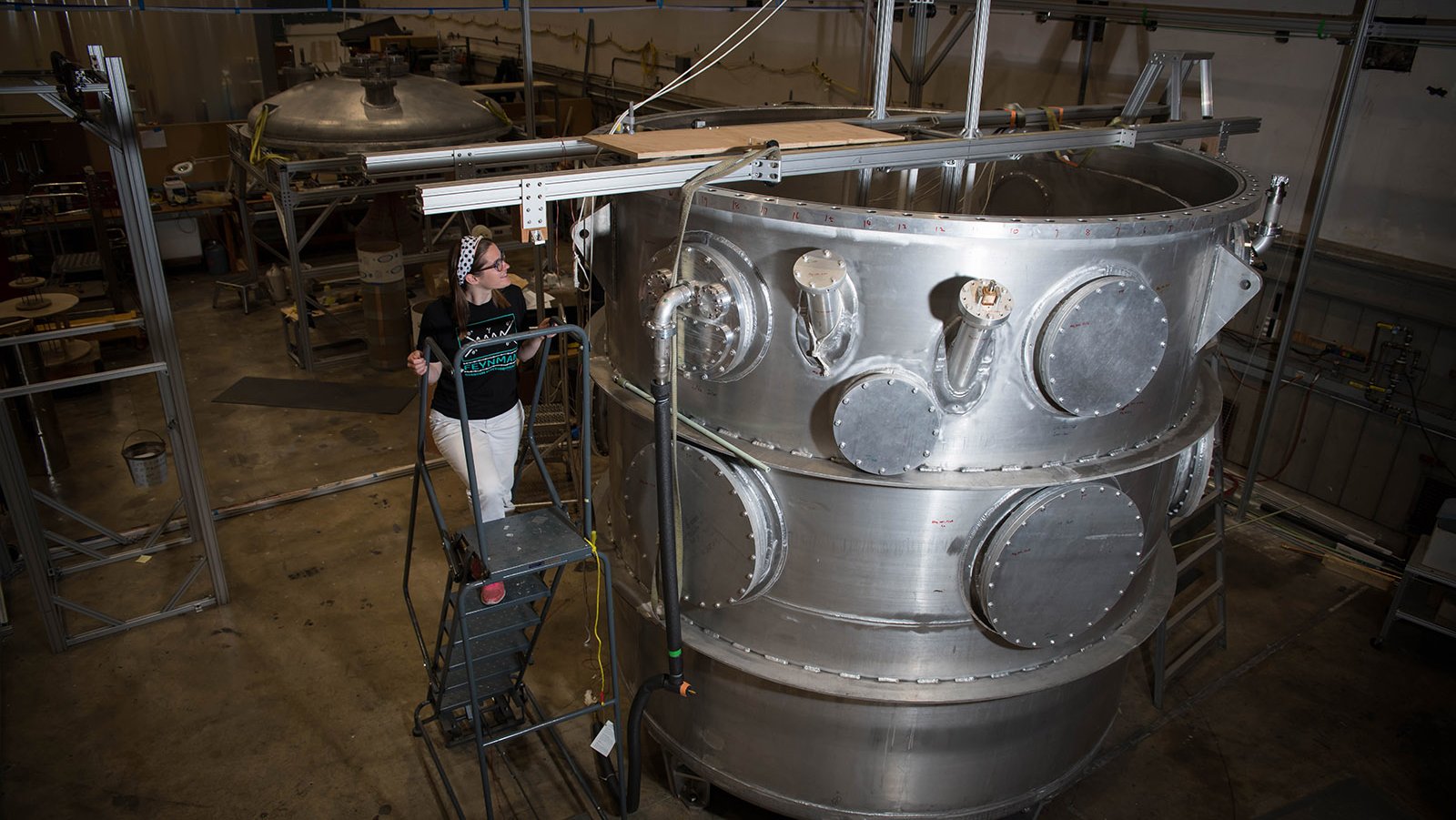 A photo of a person in an engineering lab