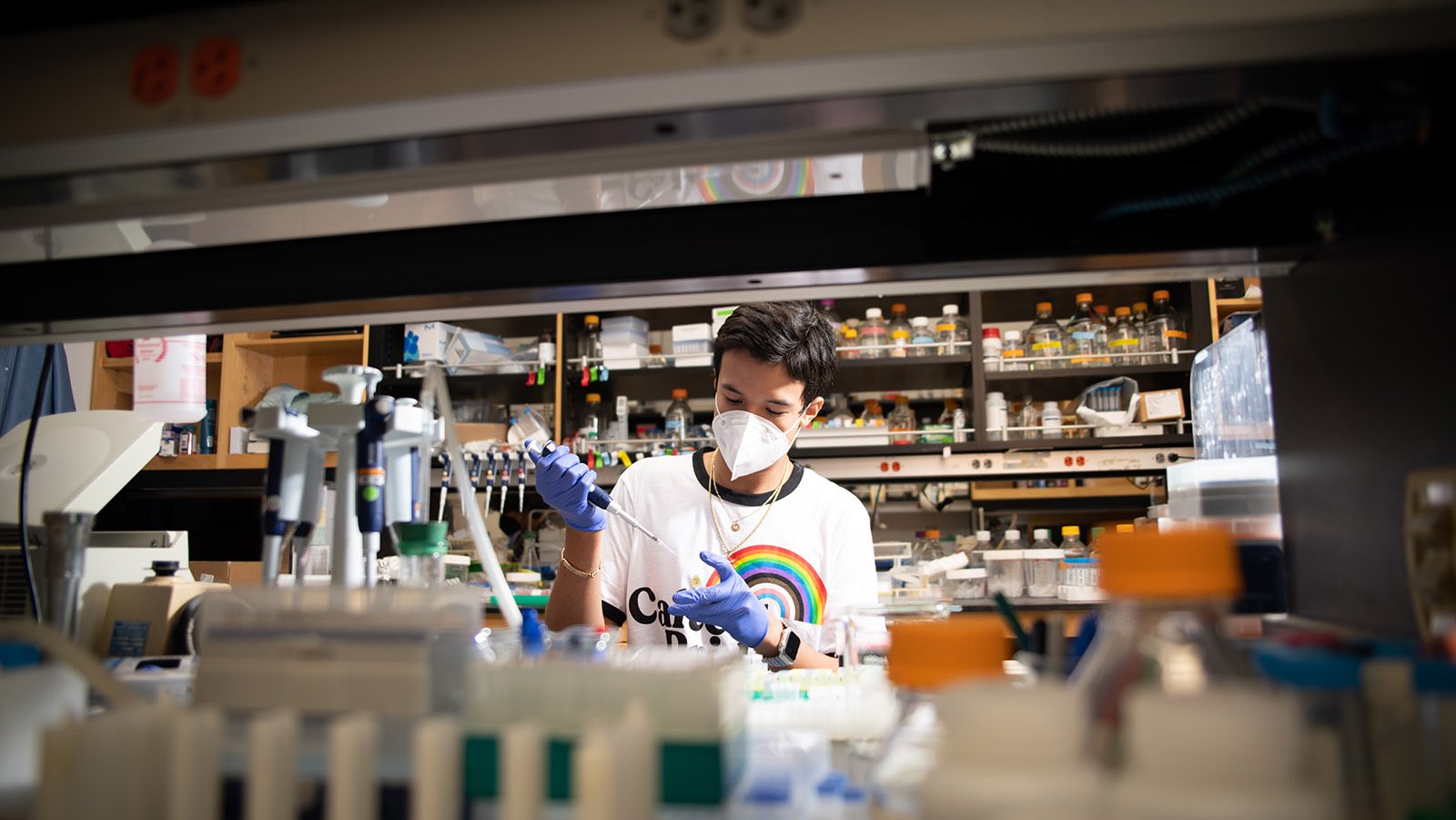 A photo of a person working in a lab