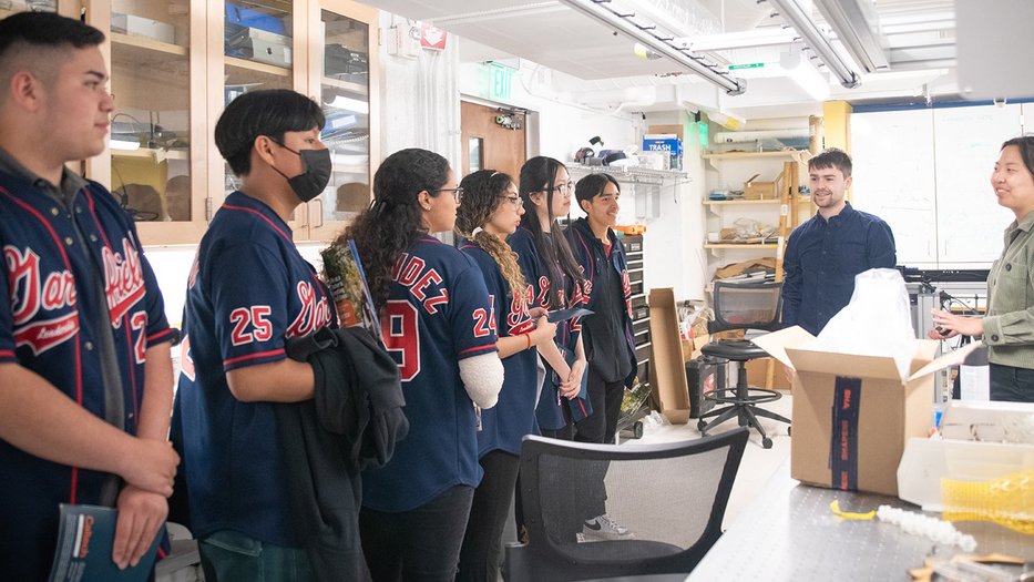 students tour a lab as part of the Junior Watson Program