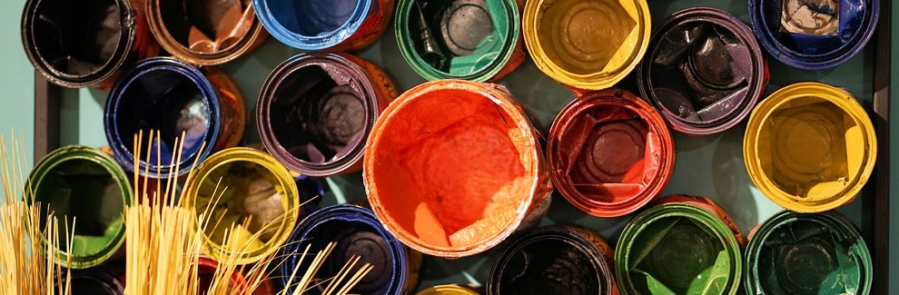 Colorful open paint cans