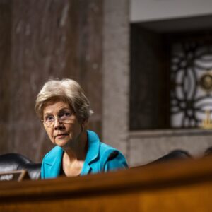 Sen Elizabeth Warren sits during a Senate committee hearing.