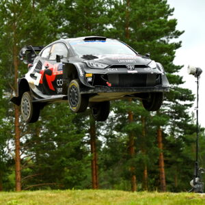 A Toyota GR Yaris rally car soars through the air during testing for Rally Finland.