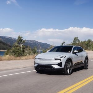 A Polestar 3 long range single motor drives on a road