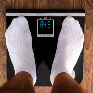 standing on a digital scale