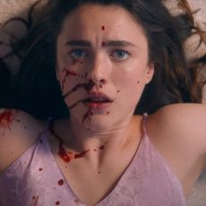 margaret qualley as sue with blood on her face in the substance