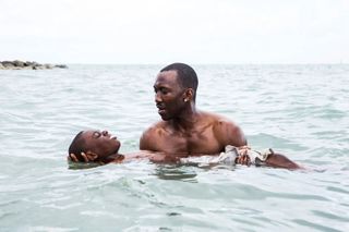 Alex Hibbert as Little and Mahershala Ali as Juan, in Barry Jenkins' 'Moonlight'