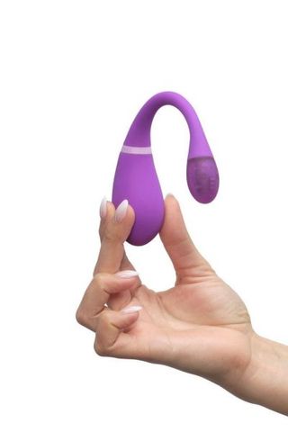 hand holding up a purple remote controlled vibrator on a white background