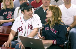 jimmy fallon and drew barrymore in red sox merch in the stands at a baseball game in fever pitch